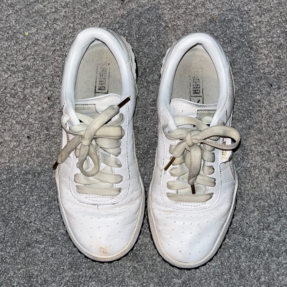 US size 7 puma white sneakers. Womens